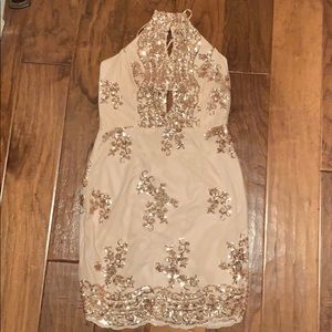 Sequins dress gold in color , adjustable straps